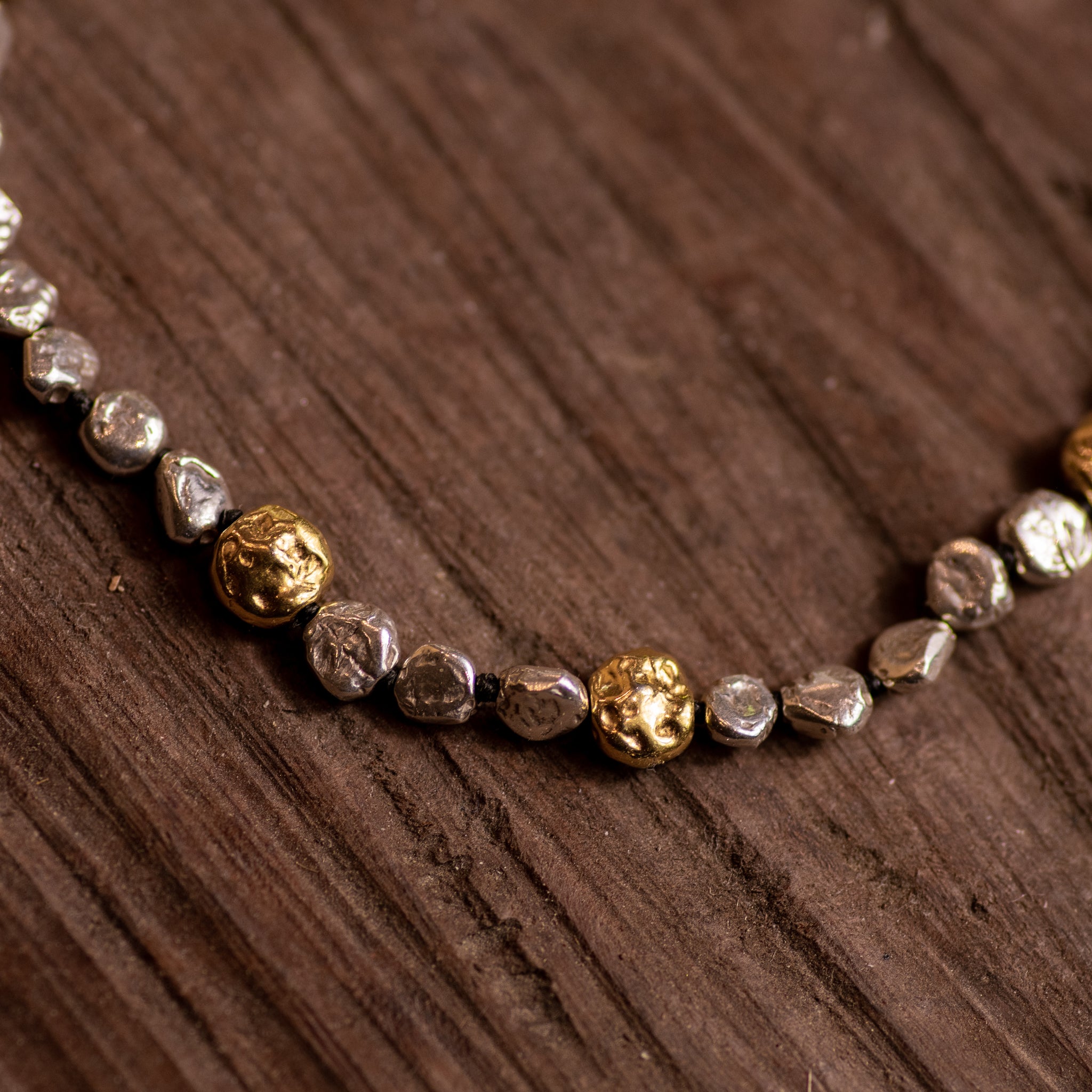 Single Strand Silver and Gold Micro Mini Lentil Bracelet